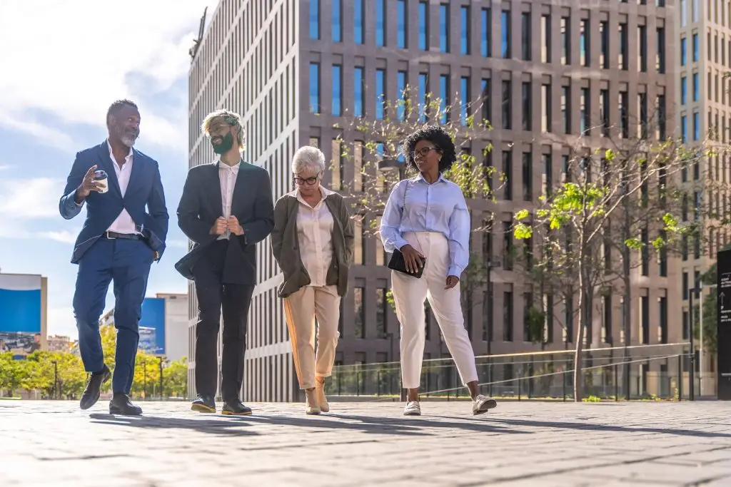 multiracial group of business people walking along 2023 11 27 05 28 47 utc